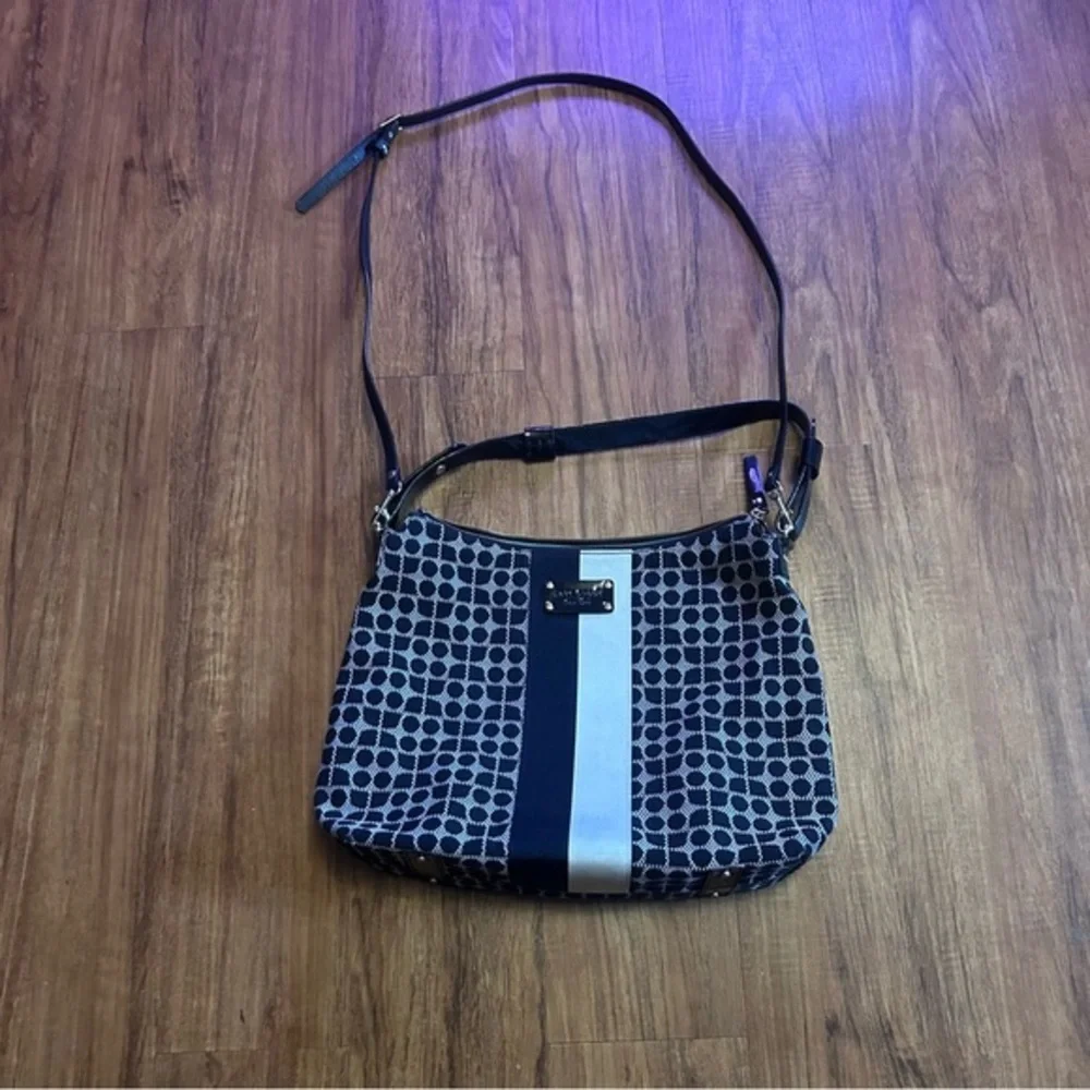 Kate Spade Penn Place Keisha crossbody bag in a black and white dot pattern